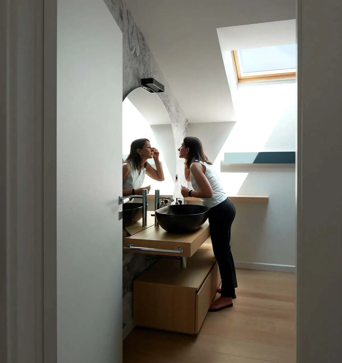 Flat roof windows in the attic in Milan